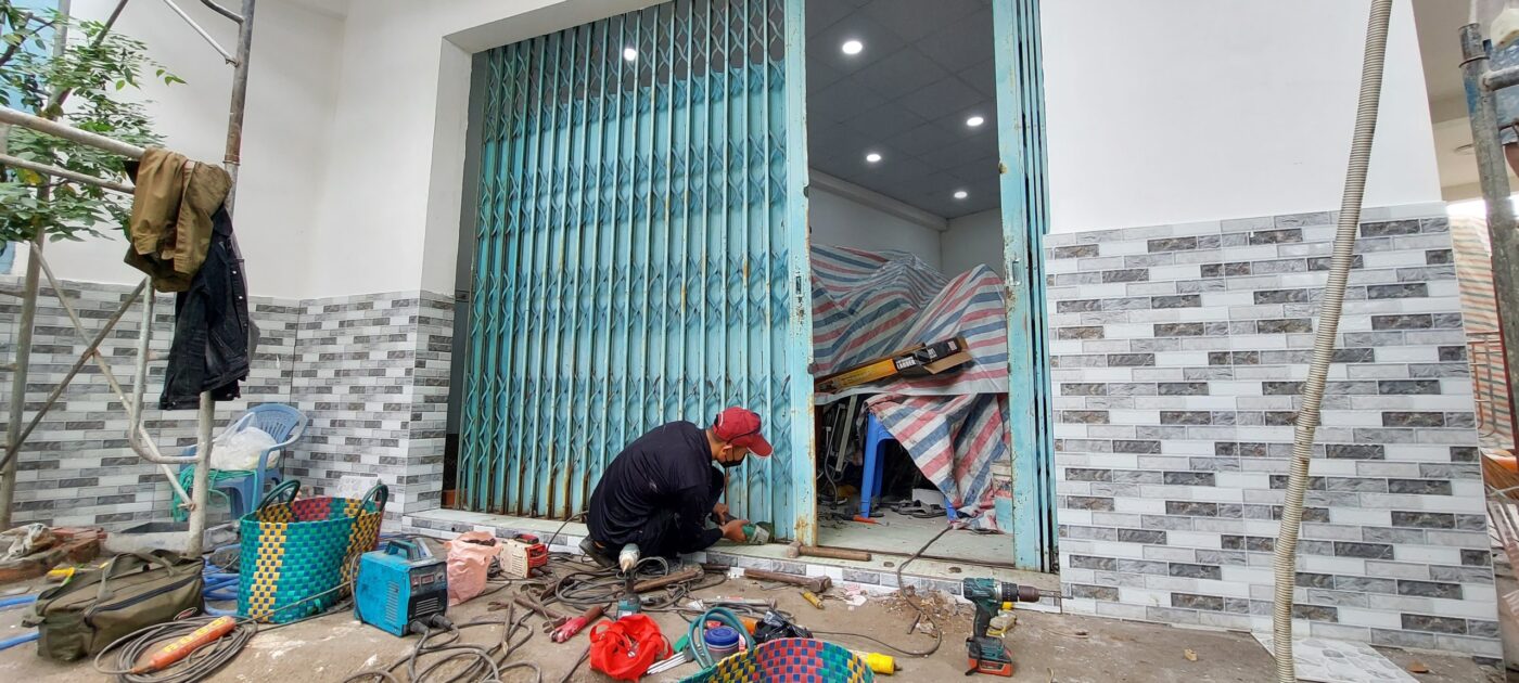 sửa cửa sắt quận 9