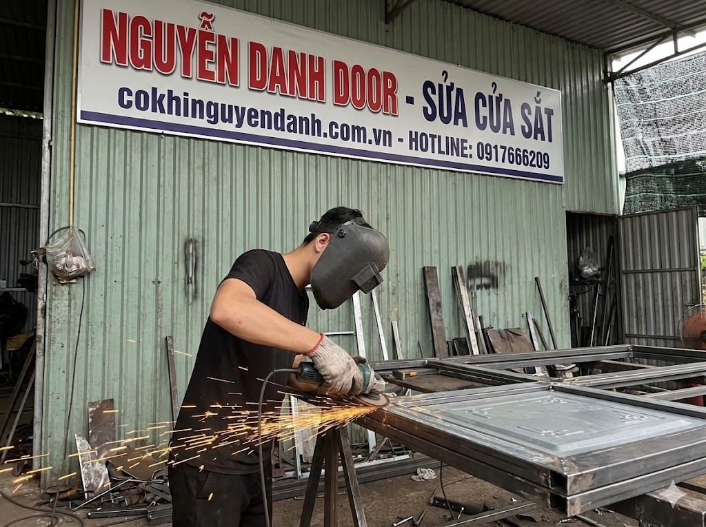 sửa cửa sắt quận 9