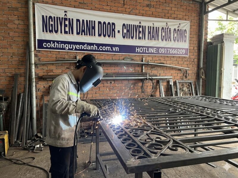 sửa cửa sắt quận 9